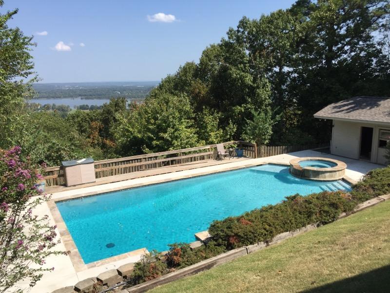Swimming pool and spa built at the top of hill overlooking the land and lake - Diamond Pools AR