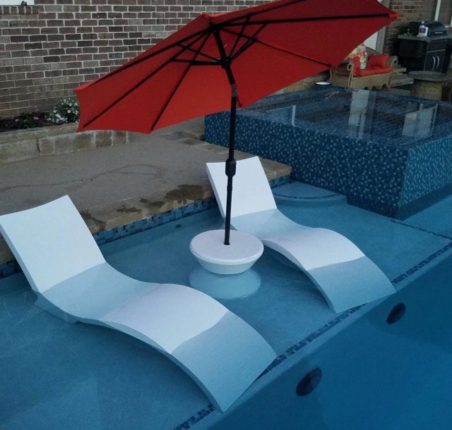 Sun bed feature mounted in swimming pool - Diamond Pools